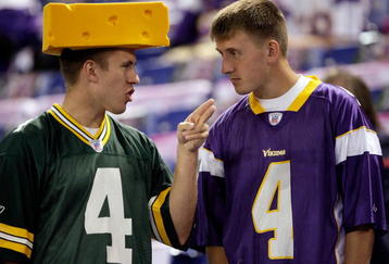 MINNEAPOLIS - OCTOBER 05:  Fans of Brett Favre #4  of the Minnesota Vikings talk prior to the start of the game against of the Green Bay Packers on October 5, 2009 at Hubert H. Humphrey Metrodome in Minneapolis, Minnesota.  (Photo by Jamie Squire/Getty Images)