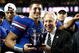 ATLANTA - DECEMBER 06:  Quarterback Tim Tebow #15 of the Florida Gators receives the Most Valuable Player award from SEC Commissioner Mike Slive after the Gators 31-20 win over the Alabama Crimson Tide in the SEC Championship on December 6, 2008 at the Georgia Dome in Atlanta, Georgia.  (Photo by Kevin C. Cox/Getty Images)