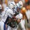 KNOXVILLE, TN - SEPTEMBER 9: Quarterback Shaun Carney #5 of the Air Force Academy Falcons hands off to running back Ryan Williams #21 against the University of Tennessee Volunteers on September 9, 2006 at Neyland Stadium in Knoxville, Tennessee.  (Photo by Stephen Dunn/Getty Images)