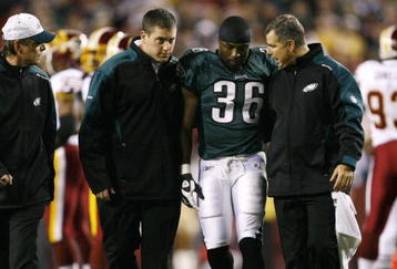 LANDOVER, MD - OCTOBER 26:  Brian Westbrook #36 of the Philadelphia Eagles is escorted off the field after getting hit during the first quarter of the game against the Washington Redskins at FedEx Field October 26, 2009 in Landover, Maryland. (Photo by Win McNamee/Getty Images)