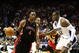 ORLANDO, FL - NOVEMBER 18: Chris Bosh #4 of the Toronto Raptors drives against Dwight Howard #12 of the Orlando Magic during the game on November 18, 2008 at Amway Arena in Orlando, Florida.  NOTE TO USER: User expressly acknowledges and agrees that, by downloading and/or using this Photograph, user is consenting to the terms and conditions of the Getty Images License Agreement.  (Photo by Sam Greenwood/Getty Images)