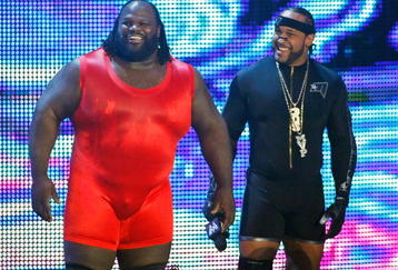 LAS VEGAS - AUGUST 24:  Wrestlers Mark Henry (L) and MVP are introduced during the WWE Monday Night Raw show at the Thomas & Mack Center August 24, 2009 in Las Vegas, Nevada.  (Photo by Ethan Miller/Getty Images)