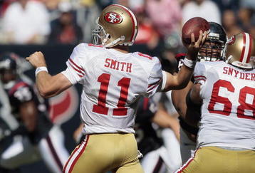 HOUSTON - OCTOBER 25:  Quarterback Alex Smith #11 of the San Francisco 49ers throws downfield at Reliant Stadium on October 25, 2009 in Houston, Texas.  (Photo by Bob Levey/Getty Images)