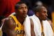 LOS ANGELES, CA - OCTOBER 27:  (L-R) Ron Artest #37 and Kobe Bryant #24 of the Los Angeles Lakers sit on the bench during the season opening game against the Los Angeles Clippers at Staples Center on October 27, 2009 in Los Angeles, California.  The Lakers won 99-92.  NOTE TO USER: User expressly acknowledges and agrees that, by downloading and or using this photograph, User is consenting to the terms and conditions of the Getty Images License Agreement. Mandatory Copyright Notice: Copyright 2009 NBAE  (Photo by Kevork Djansezian/Getty Images)