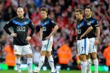 LIVERPOOL, ENGLAND - OCTOBER 25:  Wayne Rooney (L) and Michael Owen of Manchester United prepare to kick off after conceding a second goal during the Barclays Premier League match between Liverpool and Manchester United at Anfield on October 25, 2009 in Liverpool, England.  (Photo by Michael Regan/Getty Images)