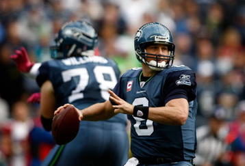 SEATTLE , WA - OCTOBER 18:  Quarterback Matt Hasselbeck #8 of the Seattle Seahawks throws a pass against the Arizona Cardinals at Qwest Field on October 18, 2009 in Seattle, Washington.  (Photo by Jonathan Ferrey/Getty Images)