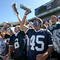 STATE COLLEGE, PA - SEPTEMBER 19: Penn State Nittany Lion fans cheer for the marching band before a game against the Temple Owls on September 19, 2009 at Beaver Stadium in State College, Pennsylvania. (Photo by Hunter Martin/Getty Images)