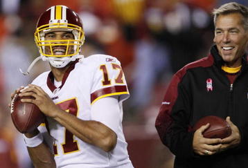 LANDOVER, MD - OCTOBER 26:  Head coach Jim Zorn of the Washington Redskins watches quarterback Jason Campbell #17 warm up before the game against the Philadelphia Eagles at FedEx Field October 26, 2009 in Landover, Maryland. (Photo by Win McNamee/Getty Images)