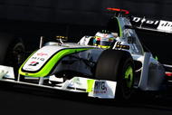 ABU DHABI, UNITED ARAB EMIRATES - OCTOBER 31:  Jenson Button of Great Britain and Brawn GP drives  during the final practice session prior to qualifying for the Abu Dhabi Formula One Grand Prix at the Yas Marina Circuit on October 31, 2009 in Abu Dhabi, United Arab Emirates.  (Photo by Clive Mason/Getty Images)