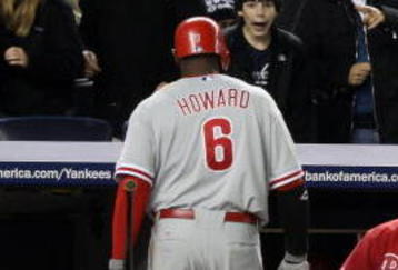 NEW YORK - OCTOBER 29:  Ryan Howard #6 of the Philadelphia Phillies walks back to the dugout after striking out for the fourth time in the game as manager Charlie Manuel looks on against the New York Yankees  in Game Two of the 2009 MLB World Series at Yankee Stadium on October 29, 2009 in the Bronx borough of New York City.  (Photo by Jed Jacobsohn/Getty Images)