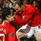 MANCHESTER, UNITED KINGDOM - MARCH 11:  Cristiano Ronaldo of Manchester United is congratulated by team mate Wayne Rooney after scoring his team's second goal during the UEFA Champions League Round of Sixteen, Second Leg match between Manchester United and Inter Milan at Old Trafford on March 11, 2009 in Manchester, England.  (Photo by Alex Livesey/Getty Images)