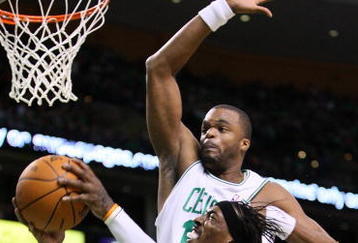 BOSTON, MA - OCTOBER 28: Shelden Williams #13 of the Boston Celtics attempts to block the shot of Gerald Wallace #3 of Charlotte Bobcats at the TD Banknorth Garden on October 28, 2009 in Boston, Massachusetts. NOTE TO USER: User expressly acknowledges and agrees that, by downloading and/or using this Photograph, user is consenting to the terms and conditions of the Getty Images License Agreement. (Photo by Jim Rogash/Getty Images)
