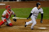 NEW YORK - OCTOBER 29:  Hideki Matsui #55 of the New York Yankees hits a solo home run in the sixth inning against the Philadelphia Phillies at Yankee Stadium on October 29, 2009 in the Bronx borough of New York City.  (Photo by Jared Wickerham/Getty Images)