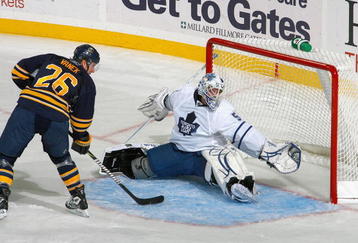 BUFFALO, NY - OCTOBER 30: Thomas Vanek #26 of the Buffalo Sabres directs a shot wide of Jonas Gustavsson #50 of the Toronto Maple Leafs at HSBC Arena on October 30, 2009 in Buffalo, New York. (Photo by Rick Stewart/Getty Images)
