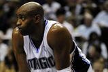 ORLANDO, FL - OCTOBER 28:  Vince Carter #15 of the Orlando Magic rests on the court during the game against the Philadelphia 76ers on October 28, 2009 at Amway Arena in Orlando, Florida.  NOTE TO USER: User expressly acknowledges and agrees that, by downloading and/or using this Photograph, user is consenting to the terms and conditions of the Getty Images License Agreement.  (Photo by Sam Greenwood/Getty Images)