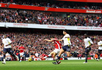 LONDON, ENGLAND - OCTOBER 31:  Cesc Fabregas of Arsenal scores the second goal during the Barclays Premier League match between Arsenal and Tottenham Hotspur at the Emirates Stadium on October 31, 2009 in London, England.  (Photo by Shaun Botterill/Getty Images)