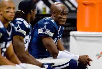 ST. LOUIS - OCTOBER 19:  Newly acquired wide receiver Roy E. Williams #11 of the Dallas Cowboys looks on from the bench area during the NFL game against the St. Louis Rams at Edward Jones Dome on October 19, 2008 in St. Louis, Missouri.  The Rams defeated the Cowboys 34-14.  (Photo by Dilip Vishwanat/Getty Images)