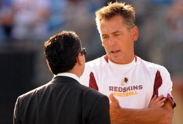 CHARLOTTE, NC - AUGUST 23:  Head coach Jim Zorn of the Washington Redskins speaks with owner Dan Snyder of the Washington Redskins before the NFL preseason game against the Carolina Panthers at Bank of America Stadium on August 23, 2008 in Charlotte, North Carolina. (Photo by Steve Dykes/Getty Images)