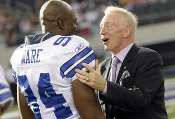 ARLINGTON, TX - AUGUST 21:  Dallas Cowboys team owner Jerry Jones talks with linebacker DeMarcus Ware #94 prior to the Cowboys taking the field against the Tennessee Titans during a preseason game at Cowboys Stadium on August 21, 2009 in Arlington, Texas. (Photo by Tom Pennington/Getty Images)