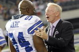 ARLINGTON, TX - AUGUST 21:  Dallas Cowboys team owner Jerry Jones talks with linebacker DeMarcus Ware #94 prior to the Cowboys taking the field against the Tennessee Titans during a preseason game at Cowboys Stadium on August 21, 2009 in Arlington, Texas. (Photo by Tom Pennington/Getty Images)