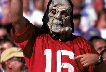 31 Oct 1999: A fan of the Arizona Cardinals dresses up in a scary halloween costume during the game against the New England Patriots at the Sun Devil Stadium in Tempe, Arizona. The Patriots defeated the Cardinals 27-3. Mandatory Credit: Donald Miralle  /Allsport