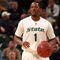 INDIANAPOLIS - MARCH 13:  Kalin Lucas #1 of the Michigan State Spartans brings the ball up court against the Minnesota Golden Gophers during the second round of the Big Ten Men's Basketball Tournament at Conseco Fieldhouse on March 13, 2009 in Indianapolis, Indiana.  (Photo by Jonathan Daniel/Getty Images)