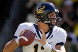 EUGENE, OR - SEPTEMBER 26: Quarterback Kevin Riley #13 of the California Bears looks for a receiver as he rolls out in the third quarter of the game against the Oregon Ducks at Autzen Stadium on September 26, 2009 in Eugene, Oregon. Oregon won the game 42-3. (Photo by Steve Dykes/Getty Images)