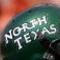 AUSTIN, TX - SEPTEMBER 2:  Quarterback Matt Phillips #18 of the North Texas Eagles drops back to pass against the Texas Longhorns on September 2, 2006 at Texas Memorial Stadium in Austin, Texas. The Longhorns defeated the Eagles 56-7.  (Photo by Ronald Martinez/Getty Images)