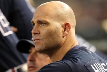 PHOENIX - MAY 30:  Pitcher Tim Hudson #15 of the Atlanta Braves watches from the dugout during the major league baseball game against the Arizona Diamondbacks at Chase Field on May 30, 2009 in Phoenix, Arizona.The Diamondbacks defeated the Braves 3-2.  (Photo by Christian Petersen/Getty Images)