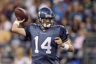 SEATTLE - SEPTEMBER 03:  Quarterback Mike Teel #14 of the Seattle Seahawks passes the ball during the game against the Oakland Raiders on September 3, 2009 at Qwest Field in Seattle, Washington. (Photo by Otto Greule Jr/Getty Images)   
