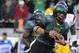 EUGENE, OR - OCTOBER 31: Quarterback Jeremiah Masoli #8 of the Oregon Ducks breaks the tackle of safety Taylor Mays #2 as he scores a touchdown in the first quarter of the game at Autzen Stadium on October 31, 2009 in Eugene, Oregon. (Photo by Steve Dykes/Getty Images)