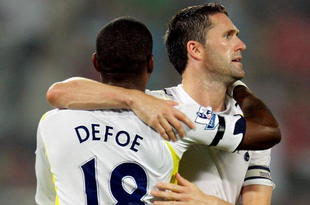 BEIJING - JULY 31:  Robbie Keane (R) of Tottenham is congratulated by Jermain Defoe after his second goal during the final of the Barclays Asia Trophy Beijing 2009 between Tottenham Hotspurs and Hull City at Workers Stadium on July 31, 2009 in Beijing, China.  (Photo by Adam Pretty/Getty Images)