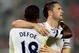 BEIJING - JULY 31: Robbie Keane (R) of Tottenham is congratulated by Jermain Defoe after his second goal during the final of the Barclays Asia Trophy Beijing 2009 between Tottenham Hotspurs and Hull City at Workers Stadium on July 31, 2009 in Beijing, China. (Photo by Adam Pretty/Getty Images)