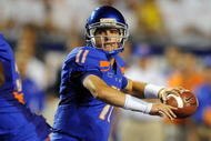 BOISE, ID - SEPTEMBER 3: Quarterback Kellen Moore #6 of the Boise State Broncos sets to throw a pass in the third quarter of the game against the Oregon Ducks at Bronco Stadium on September 3, 2009 in Boise, Idaho. Boise State won the game 19-8. (Photo by Steve Dykes/Getty Images)