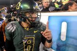 EUGENE, OR - OCTOBER 31: Quarterback Jeremiah Masoli #8 of the Oregon Ducks celebrates with fans on the sidelines as time runs down in the fourth quarter of the game against the USC Trojans at Autzen Stadium on October 31, 2009 in Eugene, Oregon. Masoli threw for 222 yards and a touchdown and ran for 164 more yards with another score as the Ducks upset the Trojans 47-20. (Photo by Steve Dykes/Getty Images)