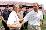 COLUMBUS, OH - SEPTEMBER 24:  Head coach Jim Tressel of Ohio State receives a hand shake from head coach Kirk Ferentz of Iowa after the fourth quarter on September 24, 2005 at Ohio Stadium in Columbus, Ohio. Ohio State defeated Iowa 31-6.  (Photo by Harry How/Getty Images)