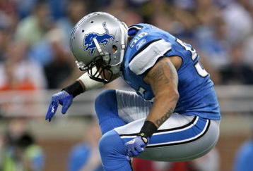 DETROIT - SEPTEMBER 20:  Linebacker Larry Foote #55 of the Detroit Lions celebrates after sacking quarterback Brett Favre of the Minnesota Vikings at Ford Field on September 20, 2009 in Detroit, Michigan. (Photo by Stephen Dunn/Getty Images)