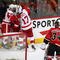 CALGARY, CANADA - OCTOBER 31:   Mike Eaves #17, Darren Helm, and Todd Bertuzzi #44 of the Detroit Red Wings celebrate teammate Brad Stuart's #23 second period Goal against  Miikka Kiprusoff #34 the Calgary Flames on October 31st, 2009 at the Pengrowth Saddledome in Calgary, Alberta, Canada. (Photo by Dale MacMillan/Getty Images)