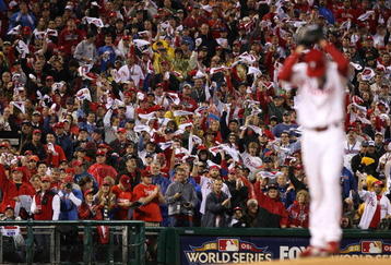 PHILADELPHIA - OCTOBER 31:  Fans cheer as Starting pitcher Cole Hamels #35 of the Philadelphia Phillies pitches against the New York Yankees in Game Three of the 2009 MLB World Series at Citizens Bank Park on October 31, 2009 in Philadelphia, Pennsylvania.  (Photo by Nick Laham/Getty Images)
