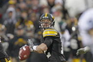 IOWA CITY, IOWA - NOVEMBER 8: Quarterback Ricky Stanzi #12 of the Iowa Hawkeyes looks down field for a receiver during the fourth quarter of play against the Penn State Nittany Lions at Kinnick Stadium on November 8, 2008 in Iowa City, Iowa. Iowa defeated Penn State  24-23. (Photo by David Purdy/Getty Images)
