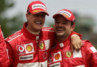 MONTREAL - JUNE 13:  Ferrari driver Michael Schumacher of Germany celebrates with fellow Ferrari driver Rubens Barichello of Brazil after Schumacher won the Canadian F1 Grand Prix at the Circuit Gilles Villeneuve in Montreal, Canada June 13, 2004.  (Photo by Mark Thompson/Getty Images) 