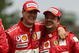 MONTREAL - JUNE 13: Ferrari driver Michael Schumacher of Germany celebrates with fellow Ferrari driver Rubens Barichello of Brazil after Schumacher won the Canadian F1 Grand Prix at the Circuit Gilles Villeneuve in Montreal, Canada June 13, 2004. (Photo by Mark Thompson/Getty Images)