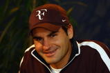 BASEL, SWITZERLAND - NOVEMBER 01:  Roger Federer of Switzerland talks to the media during previews for the Davidoff Swiss Indoors Tennis at St Jakobshalle on November 1, 2009 in Basel, Switzerland.  (Photo by Julian Finney/Getty Images)