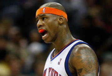 CHARLOTTE, NC - MARCH 28:  Al Harrington #7 of the New York Knicks reacts to a call during their game against the Charlotte Bobcats at Time Warner Cable Arena on March 28, 2009 in Charlotte, North Carolina.  NOTE TO USER: User expressly acknowledges and agrees that, by downloading and/or using this Photograph, user is consenting to the terms and conditions of the Getty Images License Agreement.  (Photo by Streeter Lecka/Getty Images)