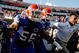JACKSONVILLE, FL - OCTOBER 31: Head coach Urban Meyer (R) of the Florida Gators leads his team onto the field to face the Georgia Bulldogs at Jacksonville Municipal Stadium on October 31, 2009 in Jacksonville, Florida. (Photo by Kevin C. Cox/Getty Images)