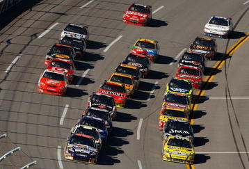 TALLADEGA, AL - NOVEMBER 01: David Reutimann, driver of the #00 Aaron's Dream Machine Toyota, and Carl Edwards, driver of the #99 SUBWAY Ford, lead the field during the NASCAR Sprint Cup Series AMP Energy 500 at Talladega Superspeedway on November 1, 2009 in Talladega, Alabama.  (Photo by Chris Graythen/Getty Images)