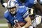 DETROIT , MI - NOVEMBER 01:  Matthew Stafford #9 of the Detroit Lions is tackled by Leonard Little #91 of the St. Louis Rams on November 1, 2009 at Ford Field in Detroit, Michigan.  (Photo by Gregory Shamus/Getty Images)