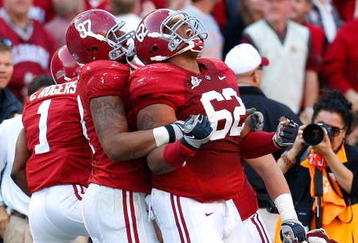 TUSCALOOSA, AL - OCTOBER 24:  Lorenzo Washington #97 celebrates with Terrence Cody #62 of the Alabama Crimson Tide after Cody blocked a field goal in the first half against the Tennessee Volunteers at Bryant-Denny Stadium on October 24, 2009 in Tuscaloosa, Alabama.  (Photo by Kevin C. Cox/Getty Images)
