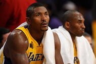 LOS ANGELES, CA - OCTOBER 27: (L-R) Ron Artest #37 and Kobe Bryant #24 of the Los Angeles Lakers sit on the bench during the season opening game against the Los Angeles Clippers at Staples Center on October 27, 2009 in Los Angeles, California. The Lakers won 99-92. NOTE TO USER: User expressly acknowledges and agrees that, by downloading and or using this photograph, User is consenting to the terms and conditions of the Getty Images License Agreement. Mandatory Copyright Notice: Copyright 2009 NBAE (Photo by Kevork Djansezian/Getty Images)