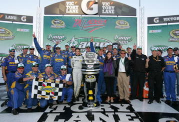TALLADEGA, AL - NOVEMBER 01:  Jamie McMurray, driver of the #26 IRWIN Marathon Ford, poses in victory lane after winning the NASCAR Sprint Cup Series AMP Energy 500 at Talladega Superspeedway on November 1, 2009 in Talladega, Alabama.  (Photo by Todd Warshaw/Getty Images for NASCAR)
